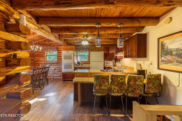 258 Marina Ln, Lafollette, TN 37766 - dining room featuring rustic walls, dark wood-style flooring, a ceiling fan, wood ceiling with exposed beams, and a chandelier