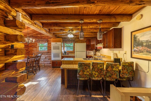 258 Marina Ln, Lafollette, TN 37766 - dining room featuring rustic walls, dark wood-style flooring, a ceiling fan, wood ceiling with exposed beams, and a chandelier