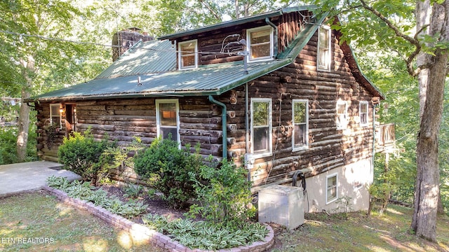 258 Marina Ln, Lafollette, TN 37766 - cabin featuring a chimney, metal roof, and log exterior