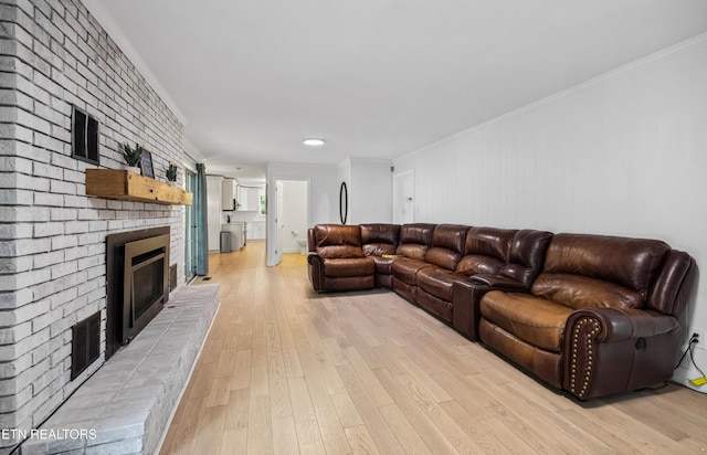 10628 Sandpiper Ln, Knoxville, TN 37922 - living area featuring a fireplace, light wood-style floors, and crown molding