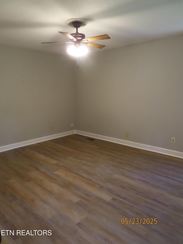 5820 Rockwood Ln, Knoxville, TN 37921 - spare room featuring ceiling fan, dark wood finished floors, and baseboards