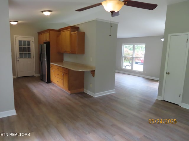 5820 Rockwood Ln, Knoxville, TN 37921 - kitchen with freestanding refrigerator, light countertops, wood finished floors, a ceiling fan, and baseboards