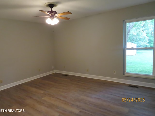 5820 Rockwood Ln, Knoxville, TN 37921 - unfurnished room with dark wood-style flooring, a ceiling fan, and baseboards