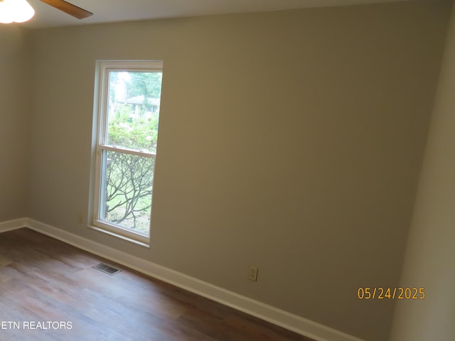 5820 Rockwood Ln, Knoxville, TN 37921 - spare room with plenty of natural light, dark wood-style floors, baseboards, and a ceiling fan