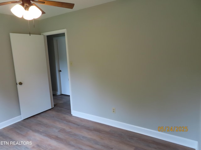 5820 Rockwood Ln, Knoxville, TN 37921 - unfurnished bedroom with wood finished floors and baseboards