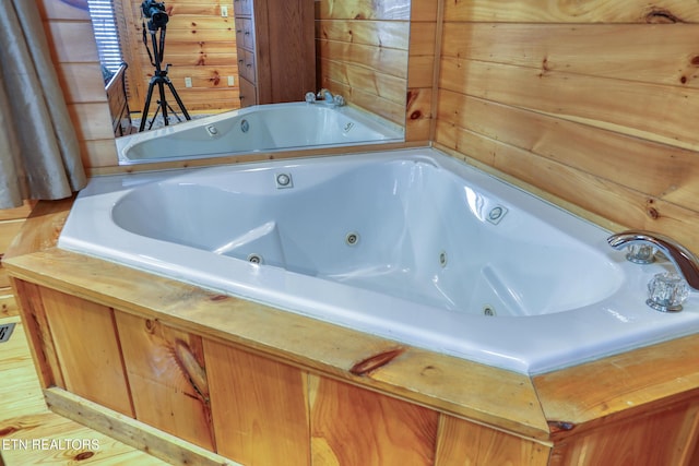 1127 Oak Ct, Gatlinburg, TN 37738 - full bath with a tub with jets and wooden walls