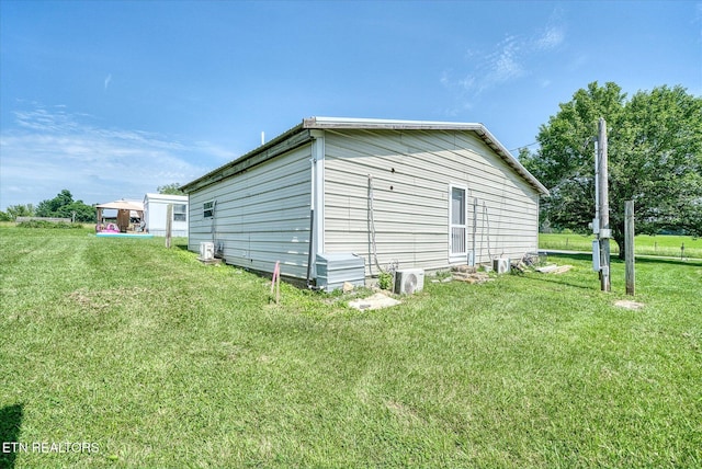 170 Bob Austin Rd, Crossville, TN 38571 - view of home's exterior featuring a yard and ac unit