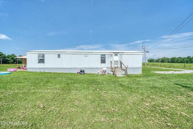 170 Bob Austin Rd, Crossville, TN 38571 - manufactured / mobile home featuring entry steps and a front yard