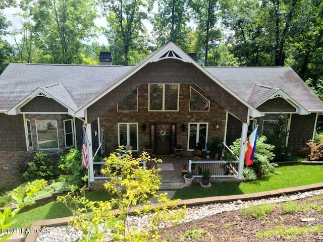180 Silver Trl, New Tazewell, TN 37825 - view of front of property featuring a patio, a chimney, roof with shingles, and a front yard