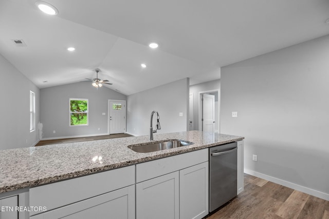 319 S Elmwood St, Knoxville, TN 37914 - kitchen featuring a sink, dishwasher, wood finished floors, white cabinetry, and light stone countertops