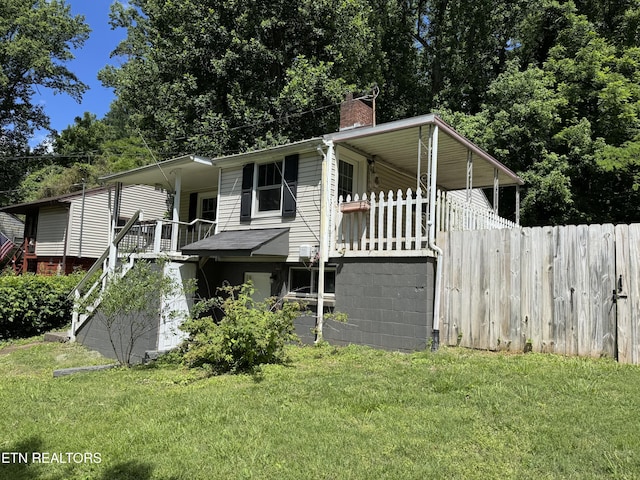 142 W Wadsworth Cir, Oak Ridge, TN 37830 - view of side of home featuring a chimney