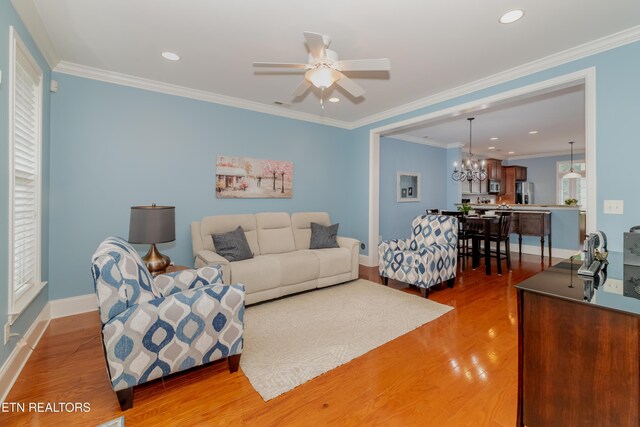 1101 Main St Unit 19, Loudon, TN 37774 - living area with wood finished floors, a ceiling fan, a chandelier, recessed lighting, and ornamental molding