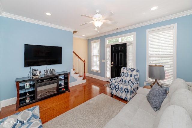 1101 Main St Unit 19, Loudon, TN 37774 - living area featuring wood finished floors, stairs, ceiling fan, recessed lighting, and crown molding