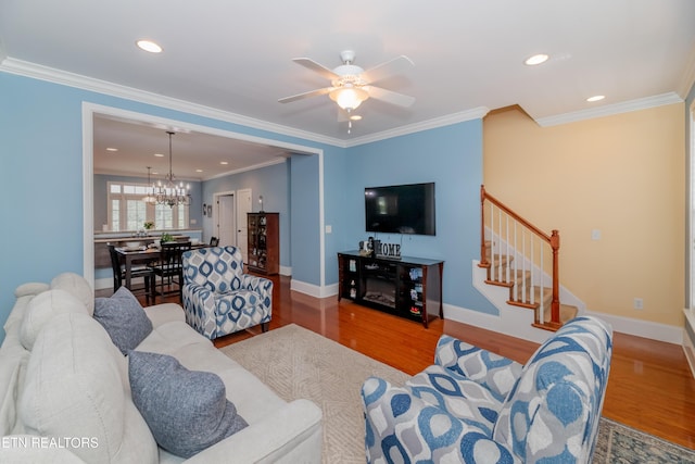 1101 Main St Unit 19, Loudon, TN 37774 - living area featuring wood finished floors, a chandelier, stairway, ceiling fan, and recessed lighting