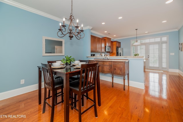 1101 Main St Unit 19, Loudon, TN 37774 - dining area featuring ornamental molding, a chandelier, light wood-style flooring, and recessed lighting