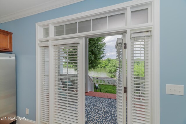 1101 Main St Unit 19, Loudon, TN 37774 - doorway to outside with ornamental molding and a water view