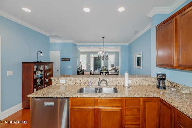 1101 Main St Unit 19, Loudon, TN 37774 - kitchen with light wood-style flooring, brown cabinets, light stone countertops, a chandelier, and crown molding