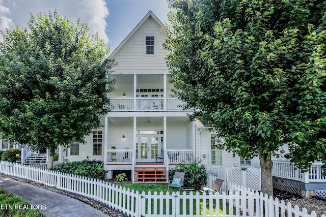 1101 Main St Unit 19, Loudon, TN 37774 - view of front of property with a fenced front yard, covered porch, french doors, a balcony, and stairs