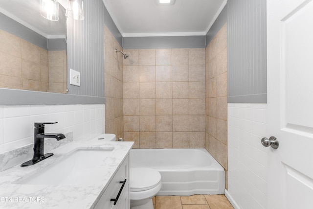 3712 Selma Ave, Knoxville, TN 37914 - full bathroom featuring toilet, vanity, tile walls, tile patterned floors, and shower / bath combination