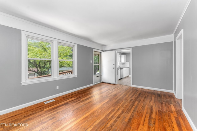 3712 Selma Ave, Knoxville, TN 37914 - spare room featuring hardwood / wood-style floors, baseboards, and ornamental molding