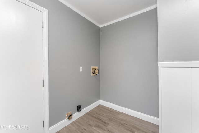 3712 Selma Ave, Knoxville, TN 37914 - laundry room featuring hookup for a washing machine, wood finished floors, baseboards, and crown molding
