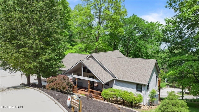 334 Little Buck Ln, Lafollette, TN 37766 - view of front of house featuring covered porch and roof with shingles