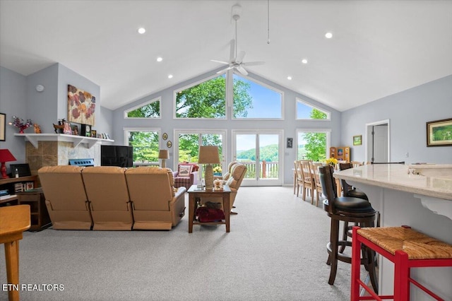 334 Little Buck Ln, Lafollette, TN 37766 - living room featuring plenty of natural light, a ceiling fan, a tiled fireplace, carpet, and recessed lighting