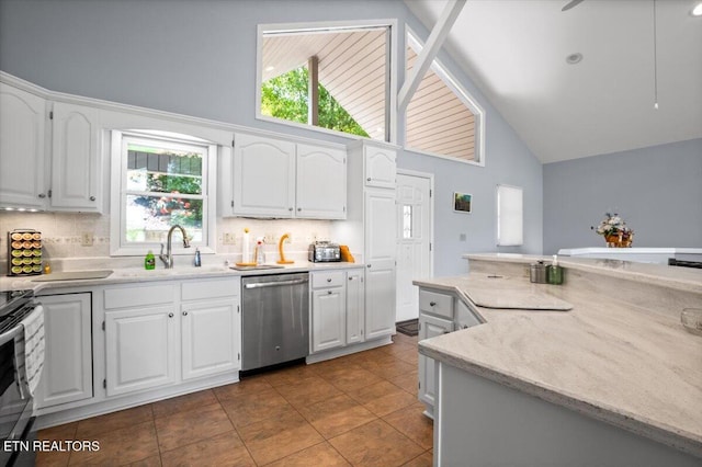 334 Little Buck Ln, Lafollette, TN 37766 - kitchen featuring dishwasher, a sink, high vaulted ceiling, decorative backsplash, and white cabinets