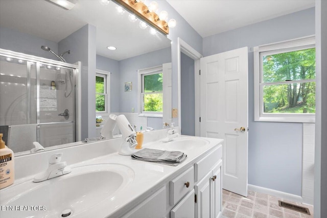 334 Little Buck Ln, Lafollette, TN 37766 - full bath with a stall shower, double vanity, and baseboards