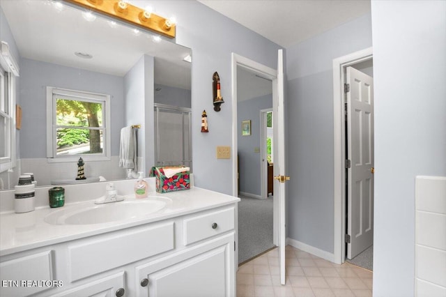 334 Little Buck Ln, Lafollette, TN 37766 - bathroom featuring vanity, a shower stall, and baseboards
