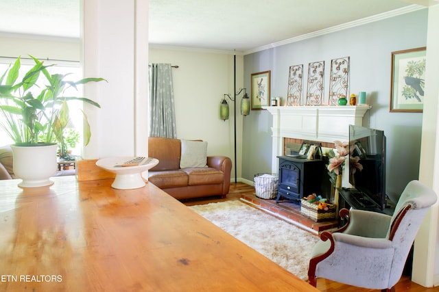 109 Cumberland View Dr, Oak Ridge, TN 37830 - living area with wood finished floors, ornamental molding, and a wood stove