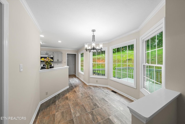 2819 Dee Peppers Dr, Knoxville, TN 37931 - unfurnished dining area featuring a chandelier, crown molding, baseboards, stone finish flooring, and recessed lighting
