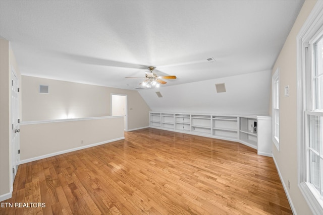 2819 Dee Peppers Dr, Knoxville, TN 37931 - bonus room with light wood-style floors, a ceiling fan, vaulted ceiling, and baseboards
