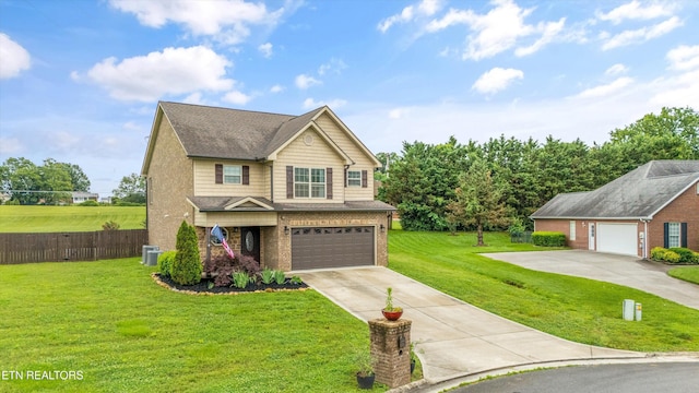1017 Brighton Dr, Alcoa, TN 37701 - view of front of home featuring an attached garage, brick siding, concrete driveway, and central AC unit