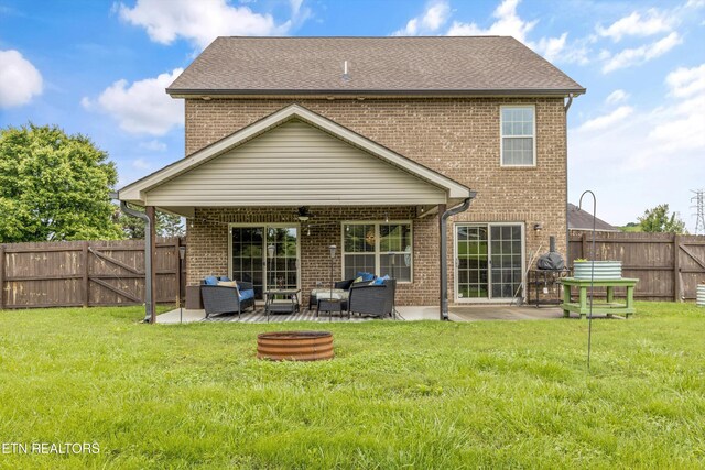 1017 Brighton Dr, Alcoa, TN 37701 - rear view of property with an outdoor living space, brick siding, and a patio