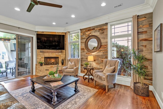 211 Cool Springs Blvd, Knoxville, TN 37934 - living room featuring ceiling fan, ornamental molding, a stone fireplace, wood finished floors, and recessed lighting