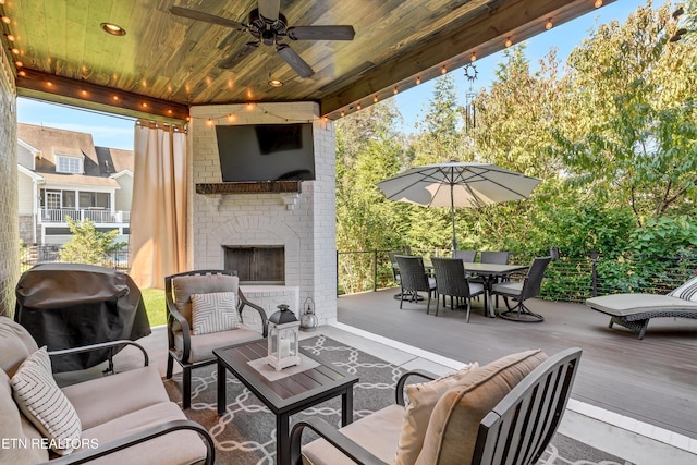 211 Cool Springs Blvd, Knoxville, TN 37934 - view of patio featuring an outdoor living space with a fireplace, outdoor dining space, a ceiling fan, and a wooden deck