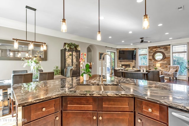 211 Cool Springs Blvd, Knoxville, TN 37934 - kitchen featuring arched walkways, a ceiling fan, open floor plan, crown molding, and a sink