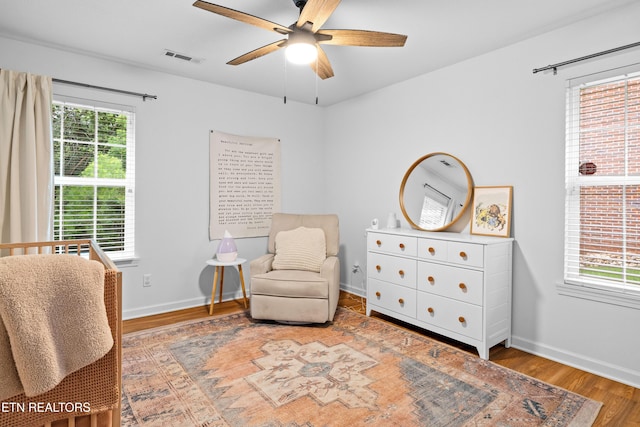 1625 Linden Hall Dr, Alcoa, TN 37701 - sitting room with wood finished floors and a ceiling fan
