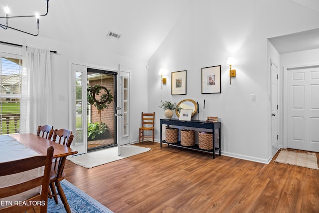 1625 Linden Hall Dr, Alcoa, TN 37701 - foyer featuring wood finished floors, a chandelier, and high vaulted ceiling