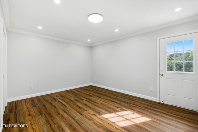 566 Allyson Dr, Kodak, TN 37764 - unfurnished room with ornamental molding, dark wood-type flooring, baseboards, and recessed lighting