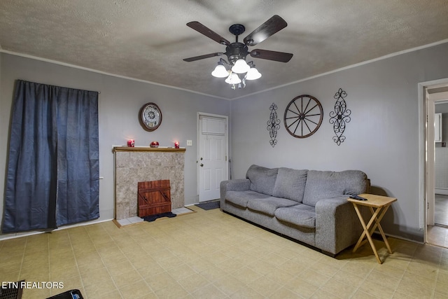 883 Old Harriman Hwy, Harriman, TN 37748 - living room featuring a ceiling fan, ornamental molding, and a textured ceiling