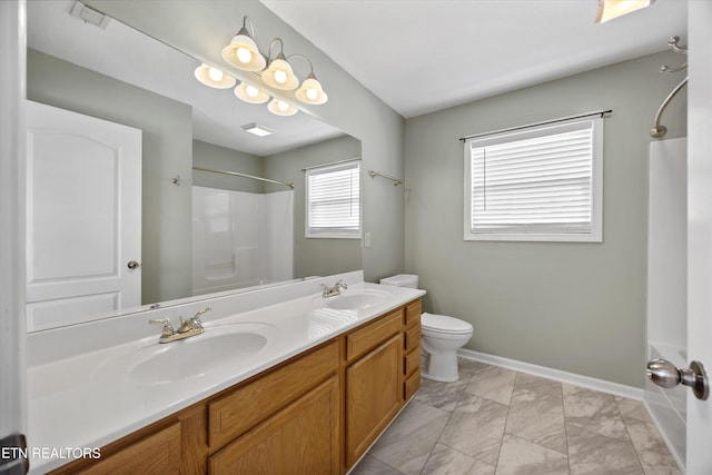 9934 Thunderbolt Way, Knoxville, TN 37923 - bathroom with toilet, marble finish flooring, double vanity,  shower combination, and baseboards