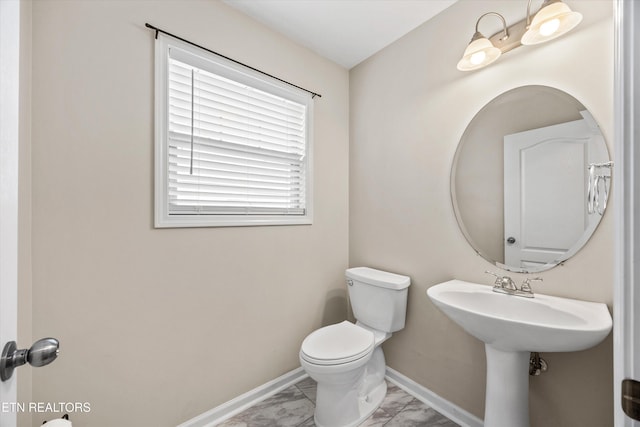 9934 Thunderbolt Way, Knoxville, TN 37923 - bathroom with marble look tile flooring, toilet, and baseboards