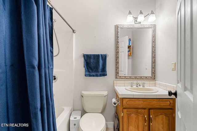 257 Copenhaver Rd, Lenoir City, TN 37771 - full bathroom featuring vanity, toilet, and shower / tub combo with curtain