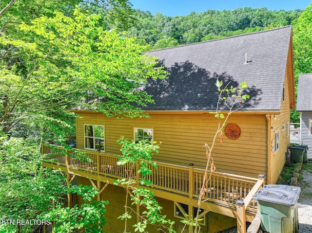 129 Bridgeview Ln, Lafollette, TN 37766 - rear view of property with roof with shingles and a wooden deck