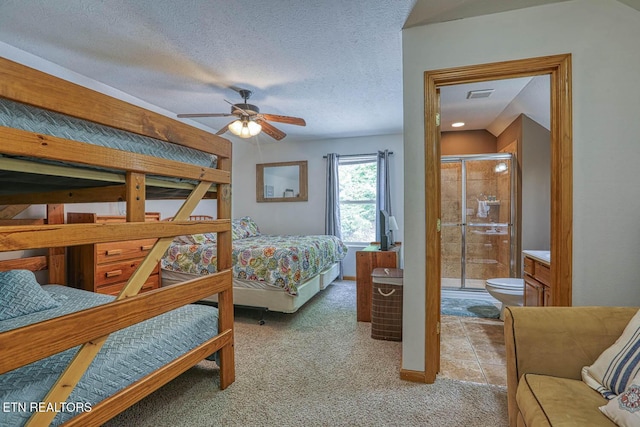 129 Bridgeview Ln, Lafollette, TN 37766 - bedroom with light carpet, ensuite bathroom, and a textured ceiling