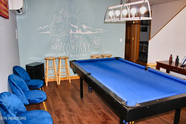 129 Bridgeview Ln, Lafollette, TN 37766 - recreation room with an AC wall unit, wood finished floors, and pool table