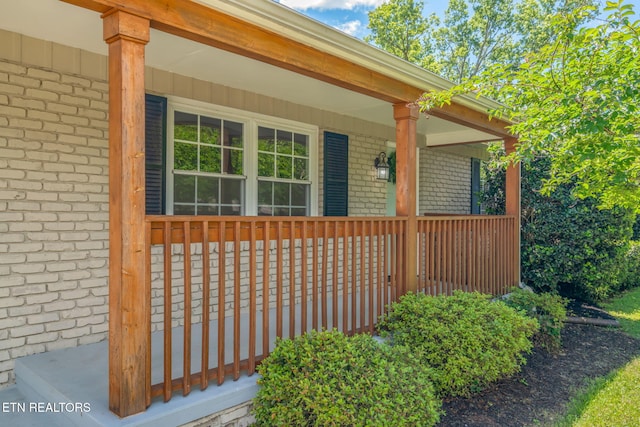 824 Noragate Rd, Knoxville, TN 37919 - view of property exterior with a porch and brick siding
