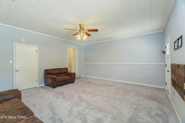 824 Noragate Rd, Knoxville, TN 37919 - unfurnished living room featuring crown molding, carpet flooring, and a ceiling fan